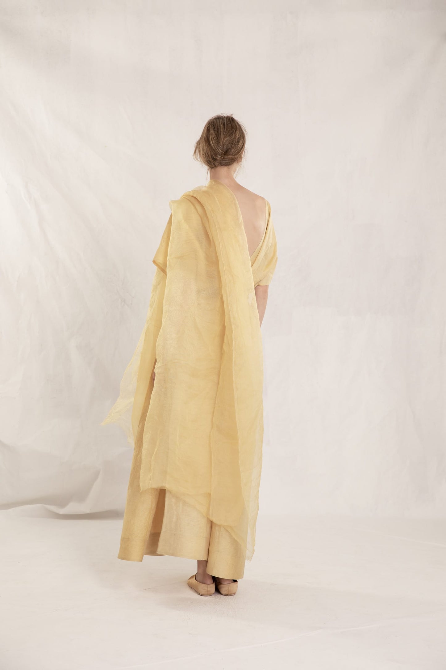 Paper, golden linen and silk dress